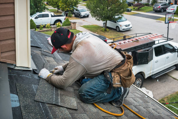 Professional Storm Damage Roof Repair technician working in Harrisville, RI